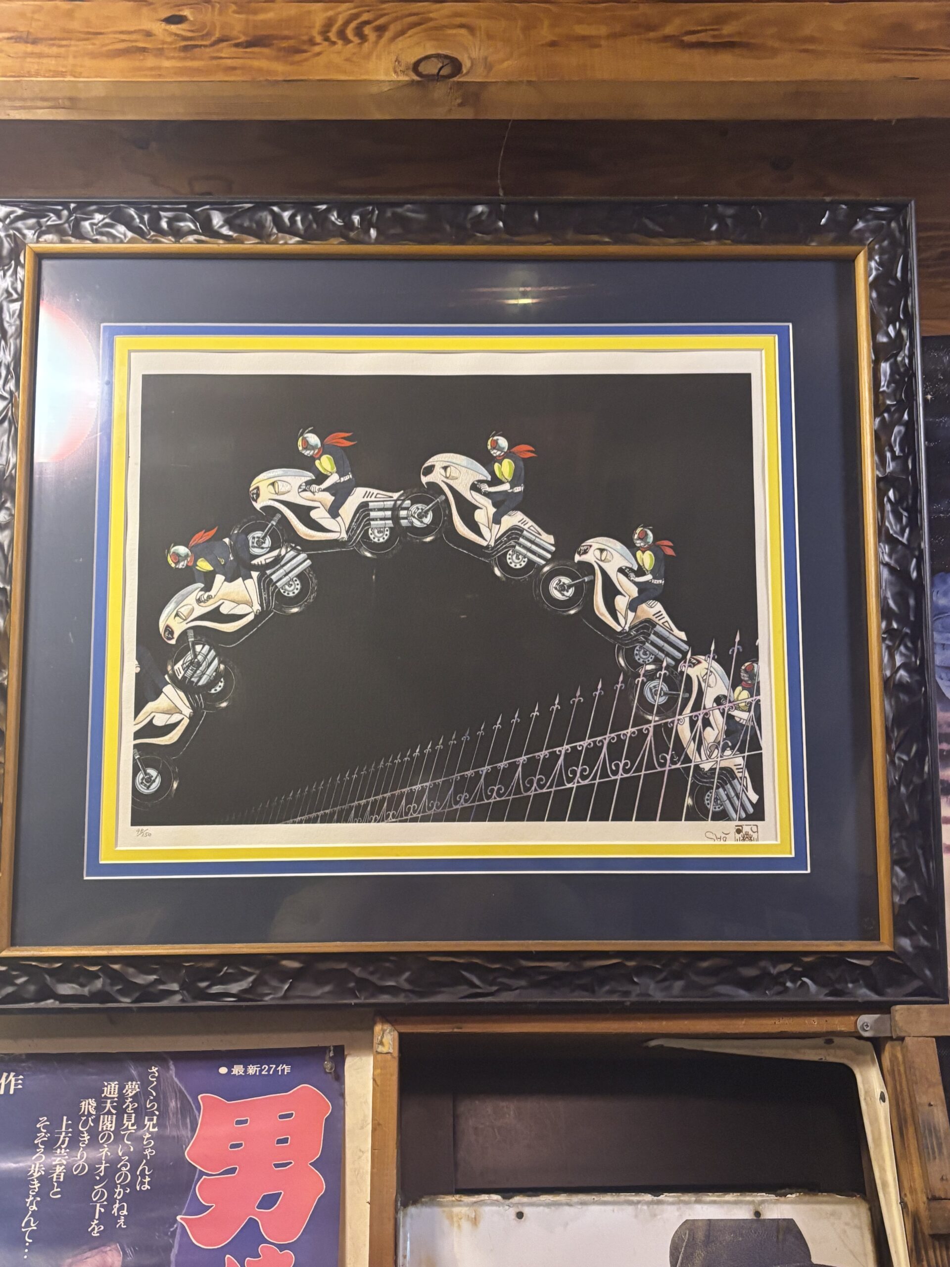 たっちゃんち店内に飾られたバイクアートの写真
